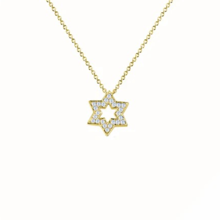 Gold necklace with a star-shaped pendant on a white background