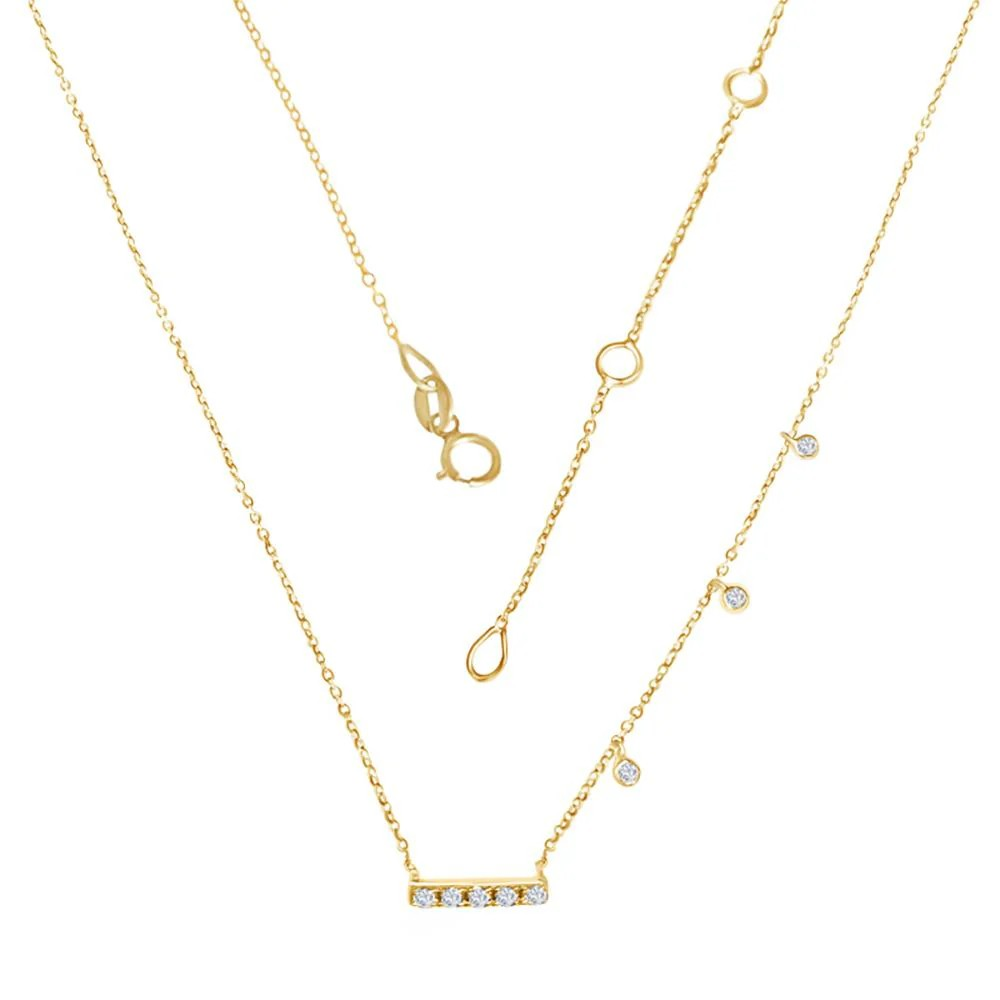 Gold necklace with a bar pendant on a white background