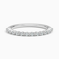 Silver ring with small diamonds on a white background