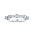 Silver ring with diamond stones on a white background