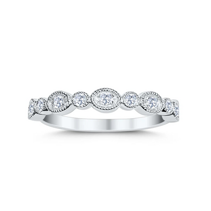 Silver ring with diamond stones on a white background