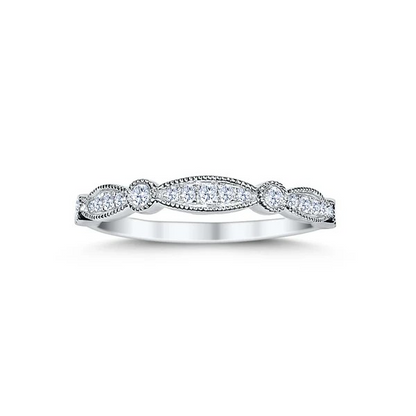 Diamond ring with a wavy design on a white background