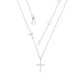 Silver necklace with cross pendant on a white background