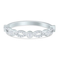 Silver ring with diamond accents on a white background