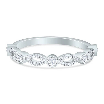 Silver ring with diamond accents on a white background