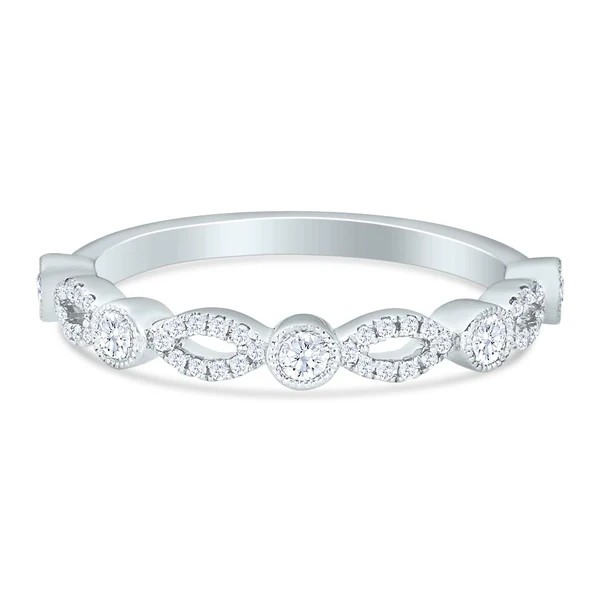 Silver ring with diamond accents on a white background