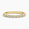 Gold ring with diamonds on a white background