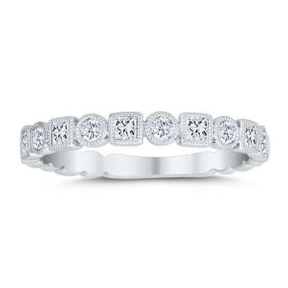 Diamond ring with a white gold band on a white background