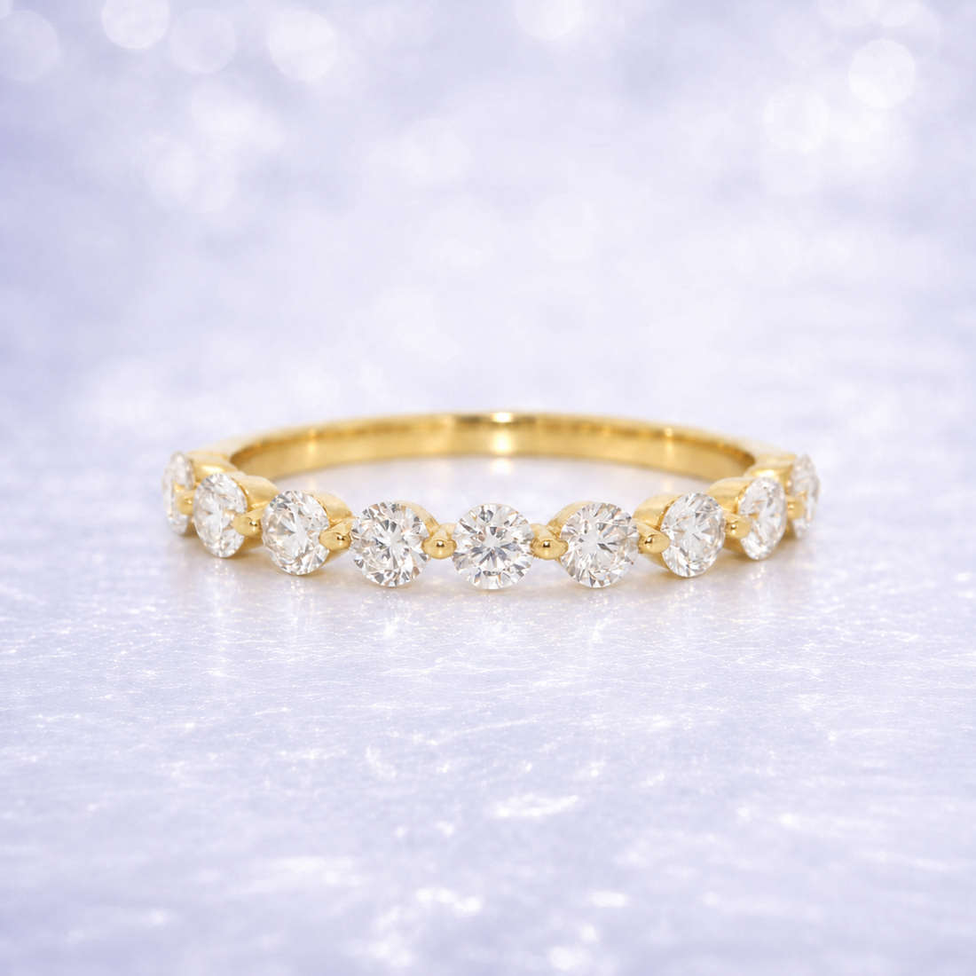 Gold ring with diamonds on a sparkling white background 14K Gold | .73ct Natural Diamond Half Eternity Shared Prong Wedding Band
