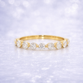 Gold ring with diamonds on a sparkling white background 14K Gold | .73ct Natural Diamond Half Eternity Shared Prong Wedding Band
