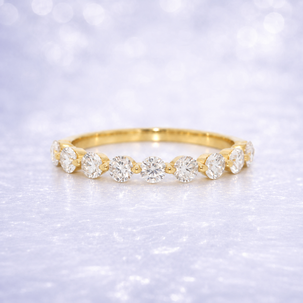 Gold ring with diamonds on a sparkling white background 14K Gold | .73ct Natural Diamond Half Eternity Shared Prong Wedding Band