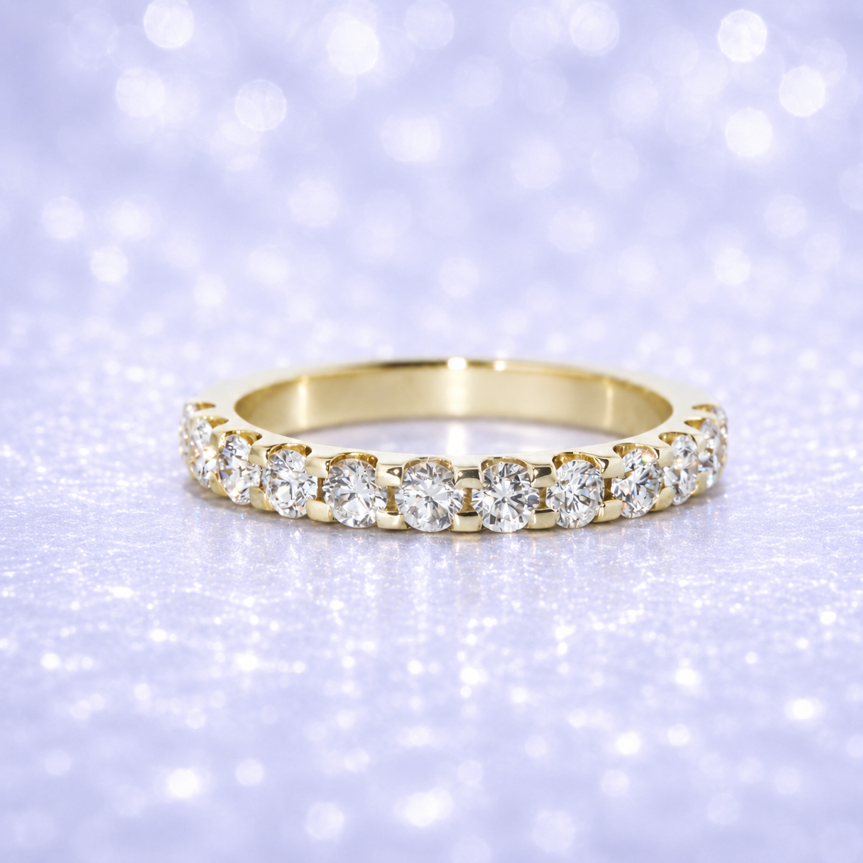 Gold ring with diamonds on a sparkling purple background 14K Gold | .91Cttw Half Eternity YG Lab Diamond Wedding Band