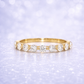 Gold ring with diamonds on a sparkling light purple background 14K Gold | .99ct Natural Diamond Half Eternity Wedding Band
