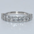 Diamond ring on a light gray background