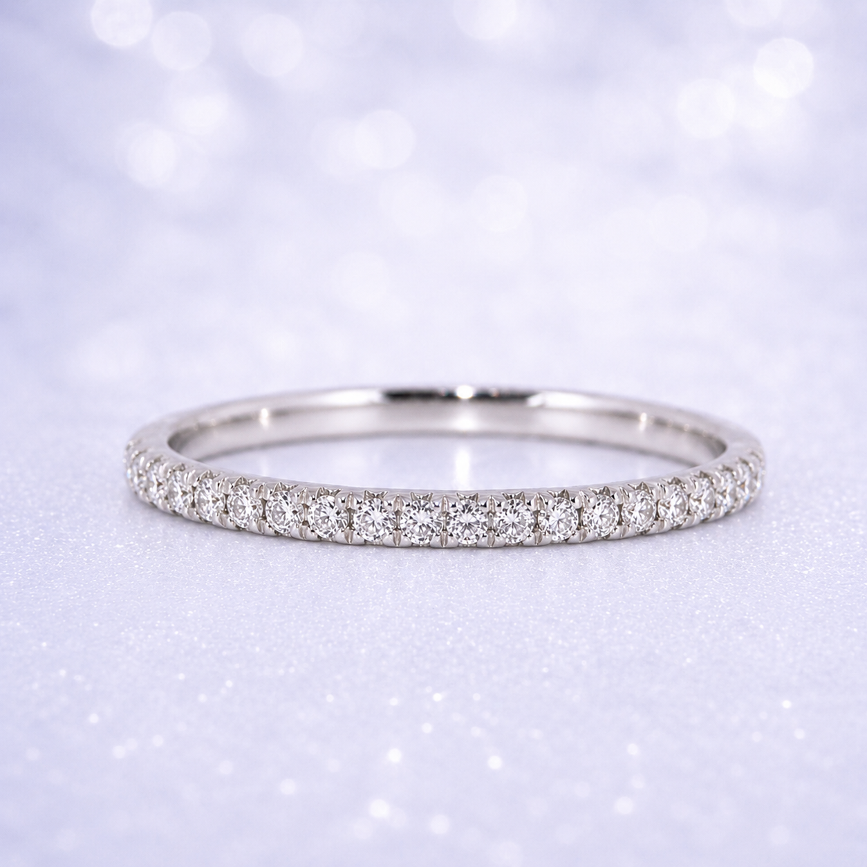 Silver ring with small diamonds on a light purple background 14K Gold | 1CT Pear Lab Grown Diamond Bridal Ring Set with Matching Wedding Band - White Gold 