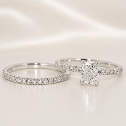 Two diamond rings on a light background
