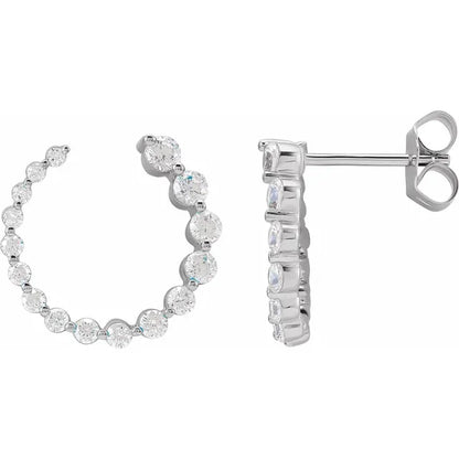 Diamond hoop earrings on a white background