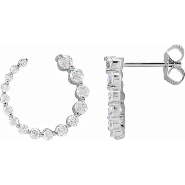 Diamond hoop earrings on a white background