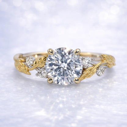Gold ring with a large diamond and smaller diamonds on a white background