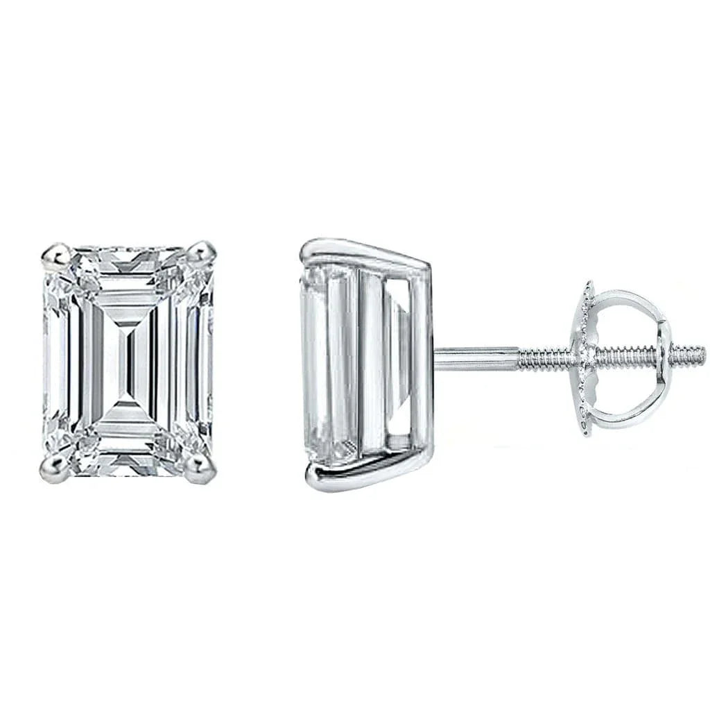 Pair of diamond stud earrings on a white background
