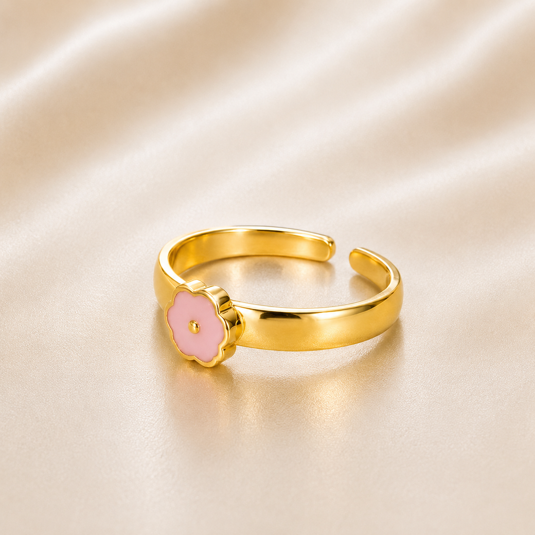Gold ring with a pink flower design on a beige fabric background 14K Gold Adjustable pink Flower Toe Ring