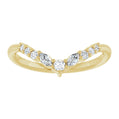 Gold ring with diamonds on a white background