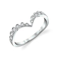 Heart-shaped silver ring with diamond accents on a white background