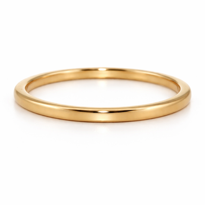 Gold ring on a white background