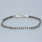 Diamond bracelet on a light gray background