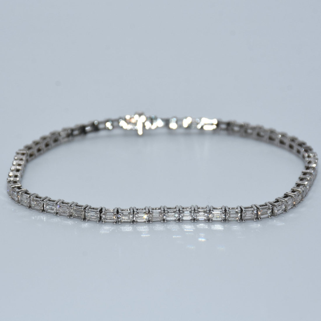 Diamond bracelet on a light gray background