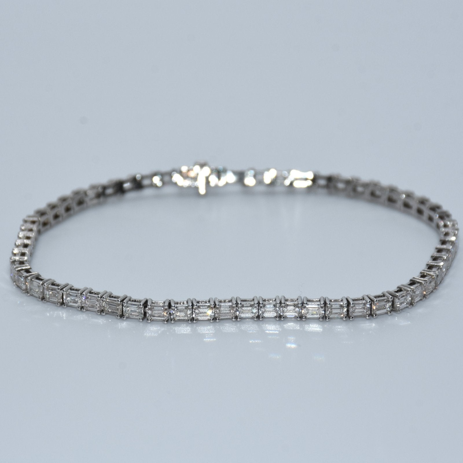 Diamond bracelet on a light gray background