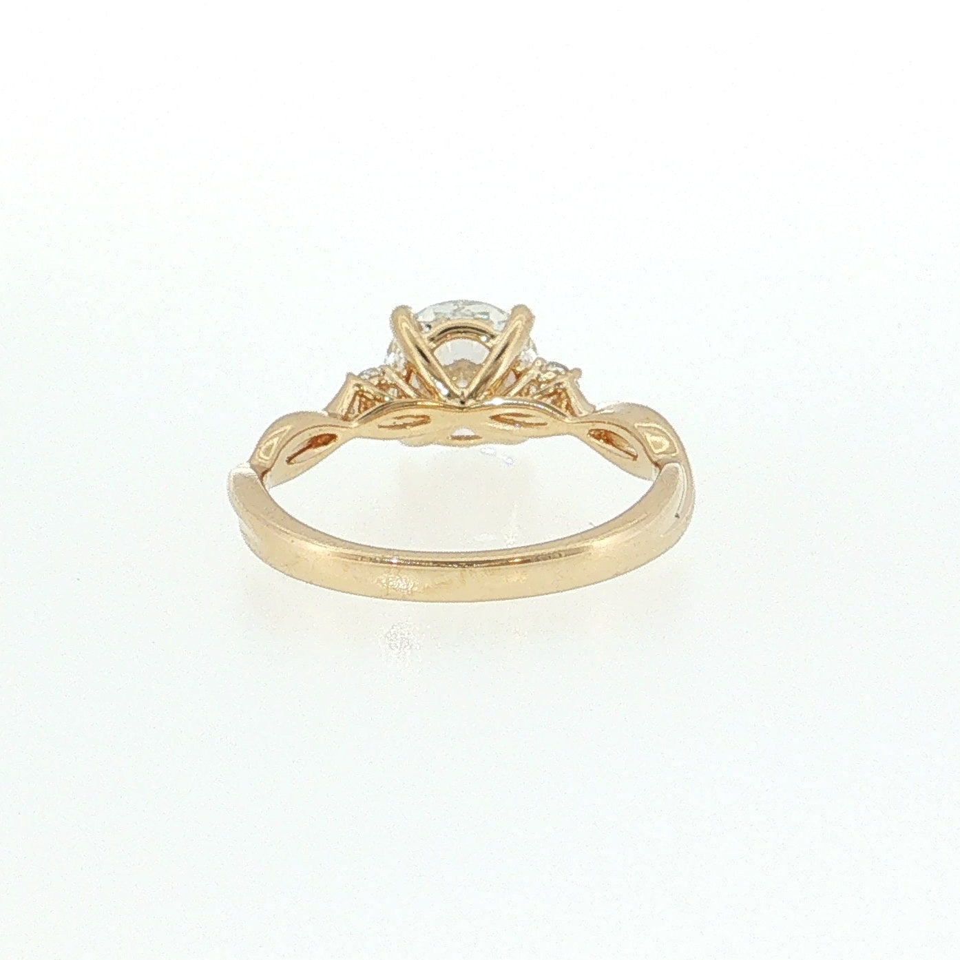 Gold ring with a diamond on a white background 14K Gold | YG 1.54ct Lab Round with .15ct Natural Round Diamond Accents Engagement Ring 