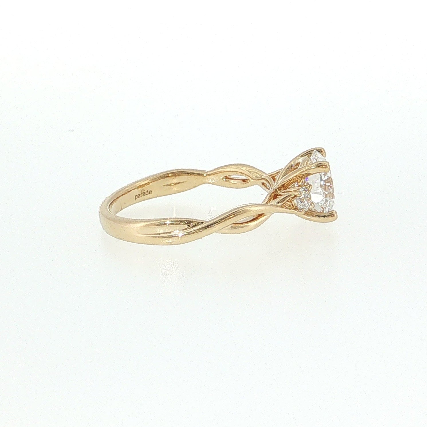 Gold ring with a diamond on a white background 14K Gold | YG 1.54ct Lab Round with .15ct Natural Round Diamond Accents Engagement Ring