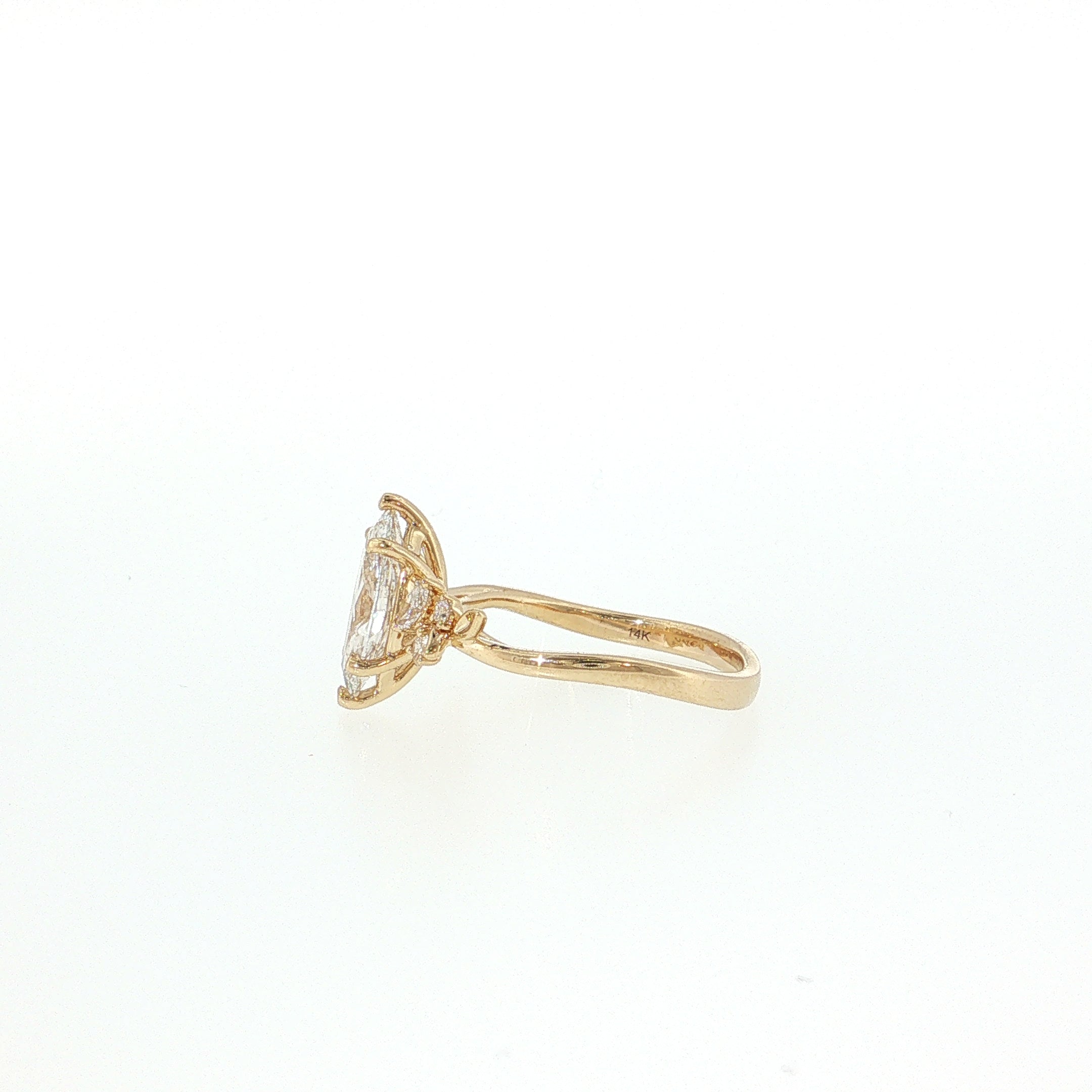 Gold ring with a diamond on a white background 14K Gold | YG 1.56ct Lab Marquise w/ .10ct Natural Round & .12ct Marquise Diamond Accents Engagement Ring