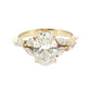 Gold ring with a large diamond and smaller diamonds on a white  14K Gold | YG 2.05ct Lab Oval with .15ct Pear & .25 Marquise Natural Diamond Accents Ring Engagement Ring background