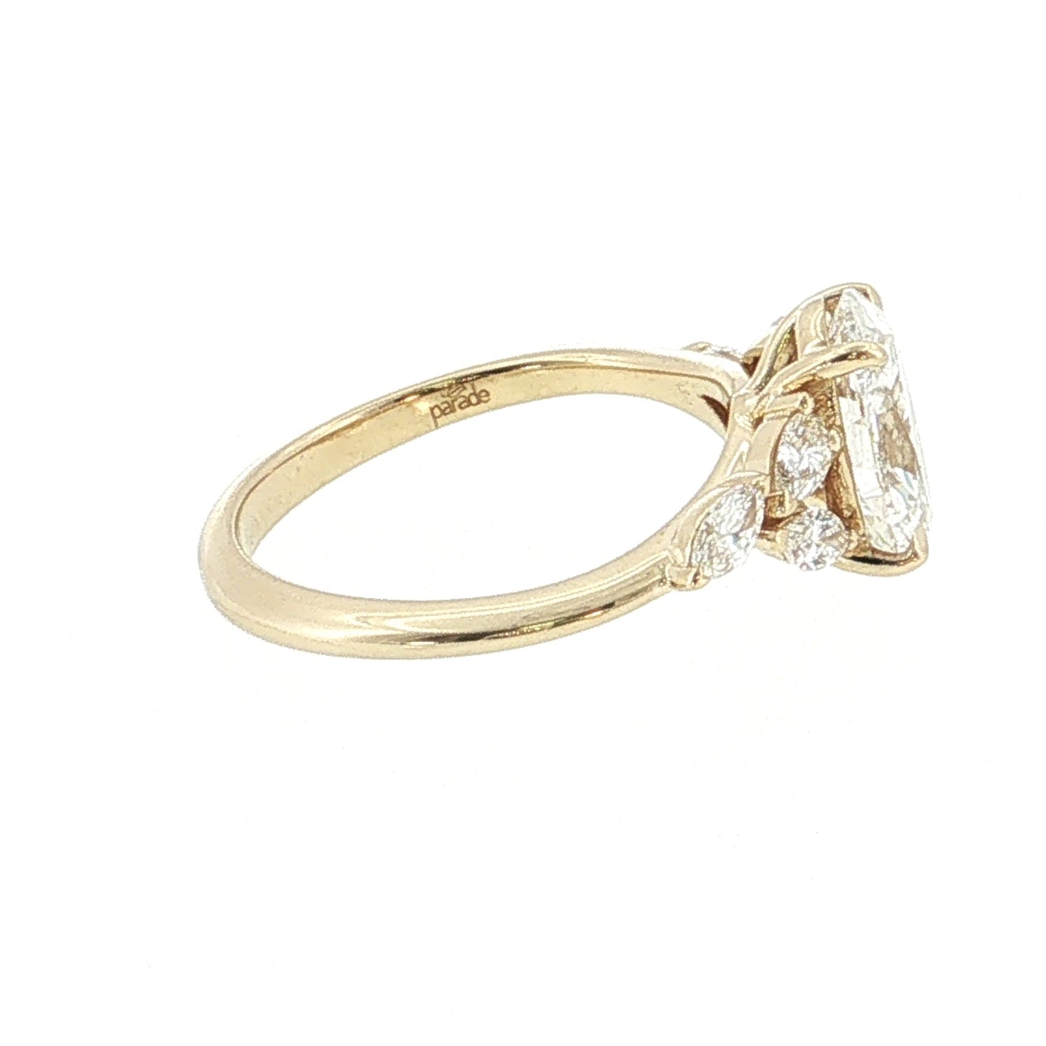Gold ring with a diamond on a white background 14K Gold | YG 2.05ct Lab Oval with .15ct Pear & .25 Marquise Natural Diamond Accents Ring Engagement Ring 