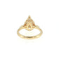 Gold ring with a decorative design  on a white background 14K Gold | YG 3.01 CT Lab Pear w/ .13ct  Natural Marquise Diamond Accents & .05ct Round Halo