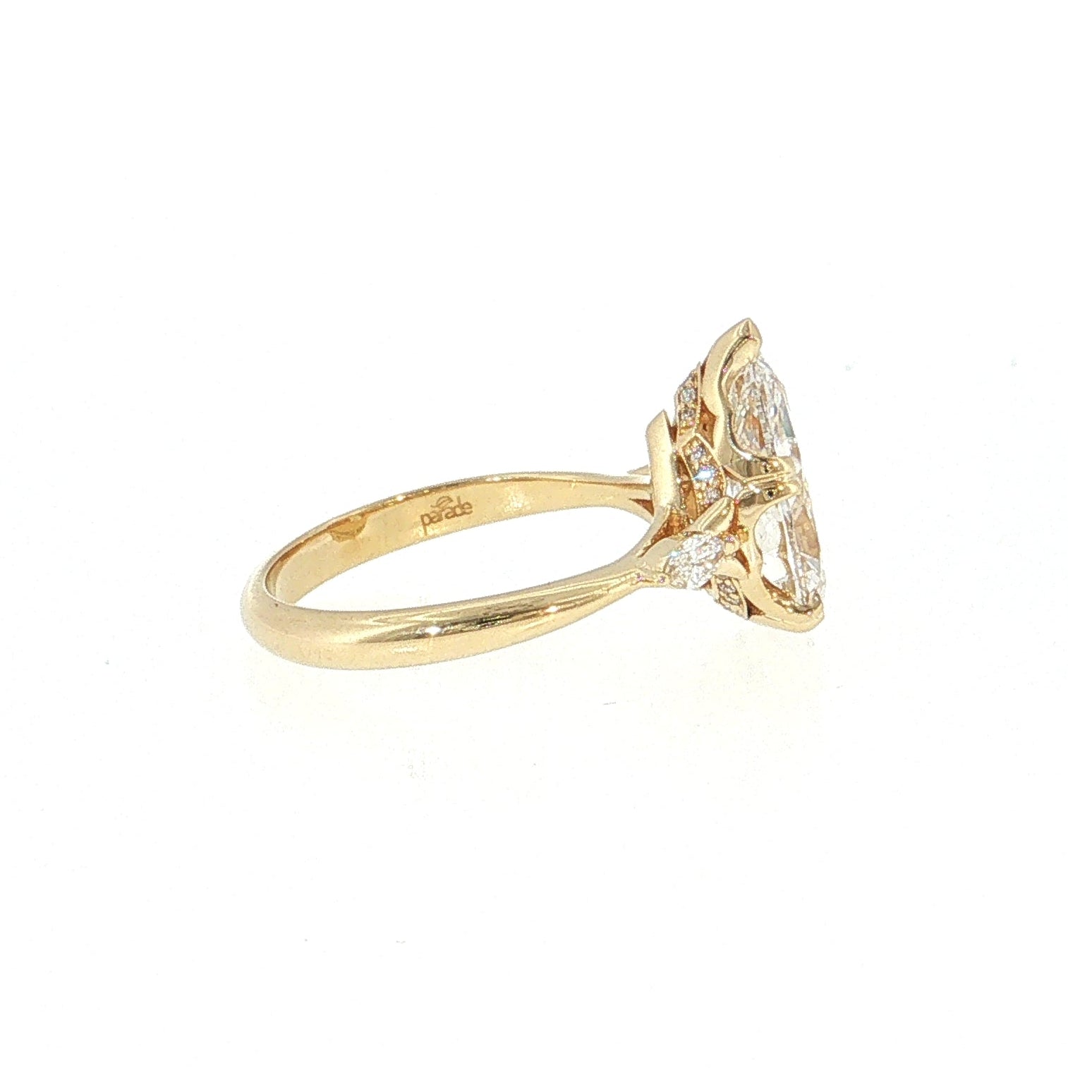 Gold ring with a diamond on a white background 14K Gold | YG 3.01 CT Lab Pear w/ .13ct  Natural Marquise Diamond Accents & .05ct Round Halo