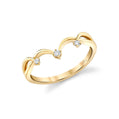 Gold heart-shaped ring with diamonds on a white background