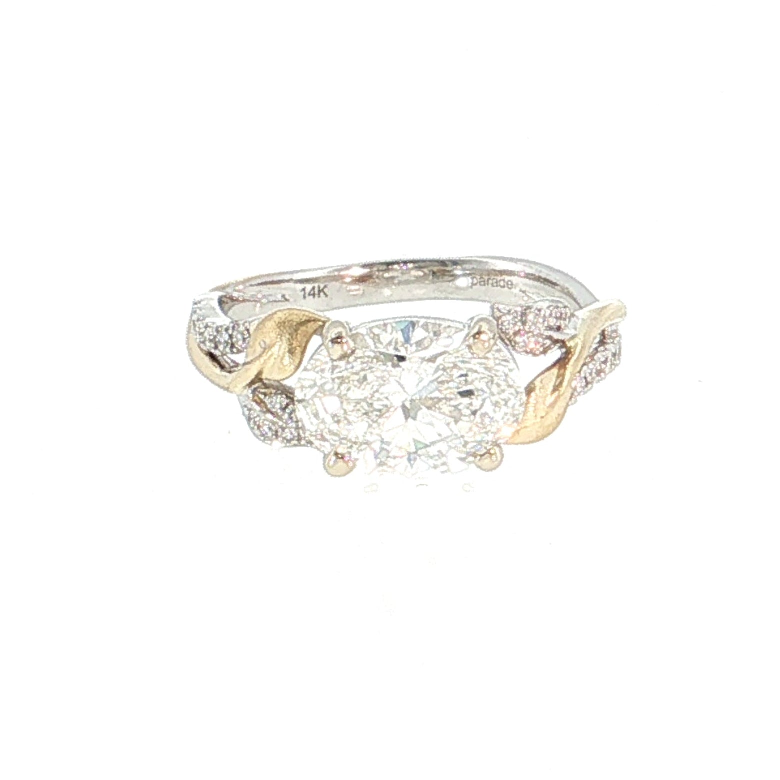 Gold and silver ring with a large central diamond and smaller diamonds on the band against a white background 14K Gold |Y/WG East-West 2.04 Lab Oval w/ .12ct Round Diamond Accents Engagement Ring