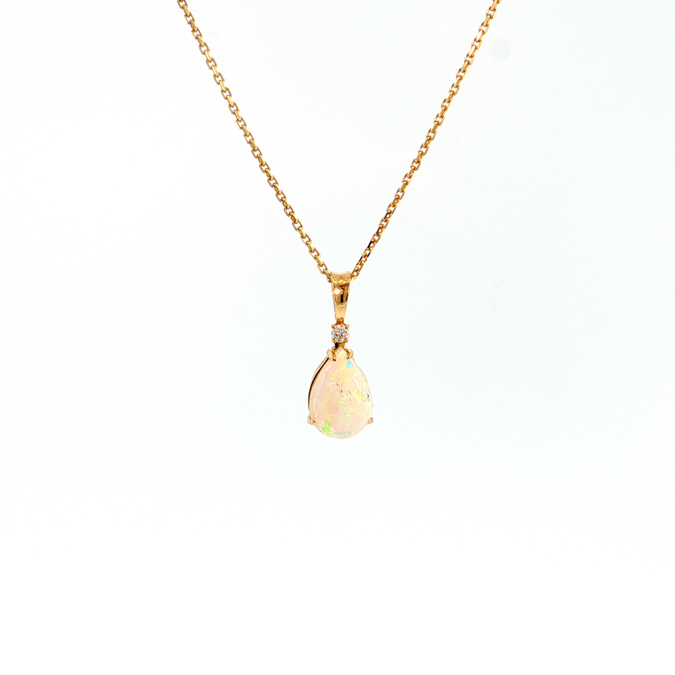 14K Gold | Yellow Gold Pear Shaped 1.05CT Opal Pendant with .03CT Round Natural Diamond