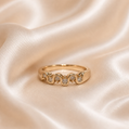 Gold ring with diamonds on a soft pink satin background 14K Gold | Zig Zag Round Natural Diamond Ring 