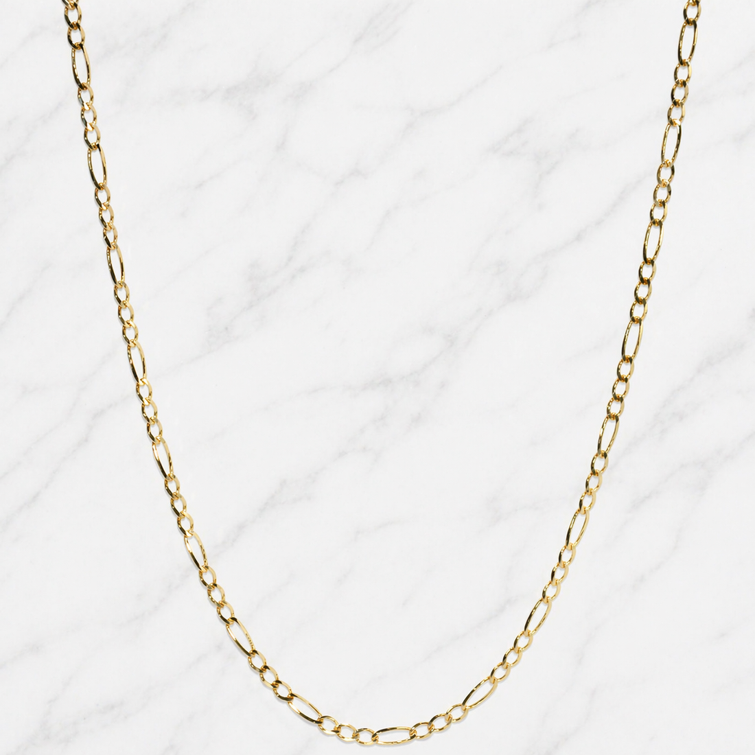 19.2K Portuguese Gold 18" 1.65mm Solid Figaro chain necklace on a white background