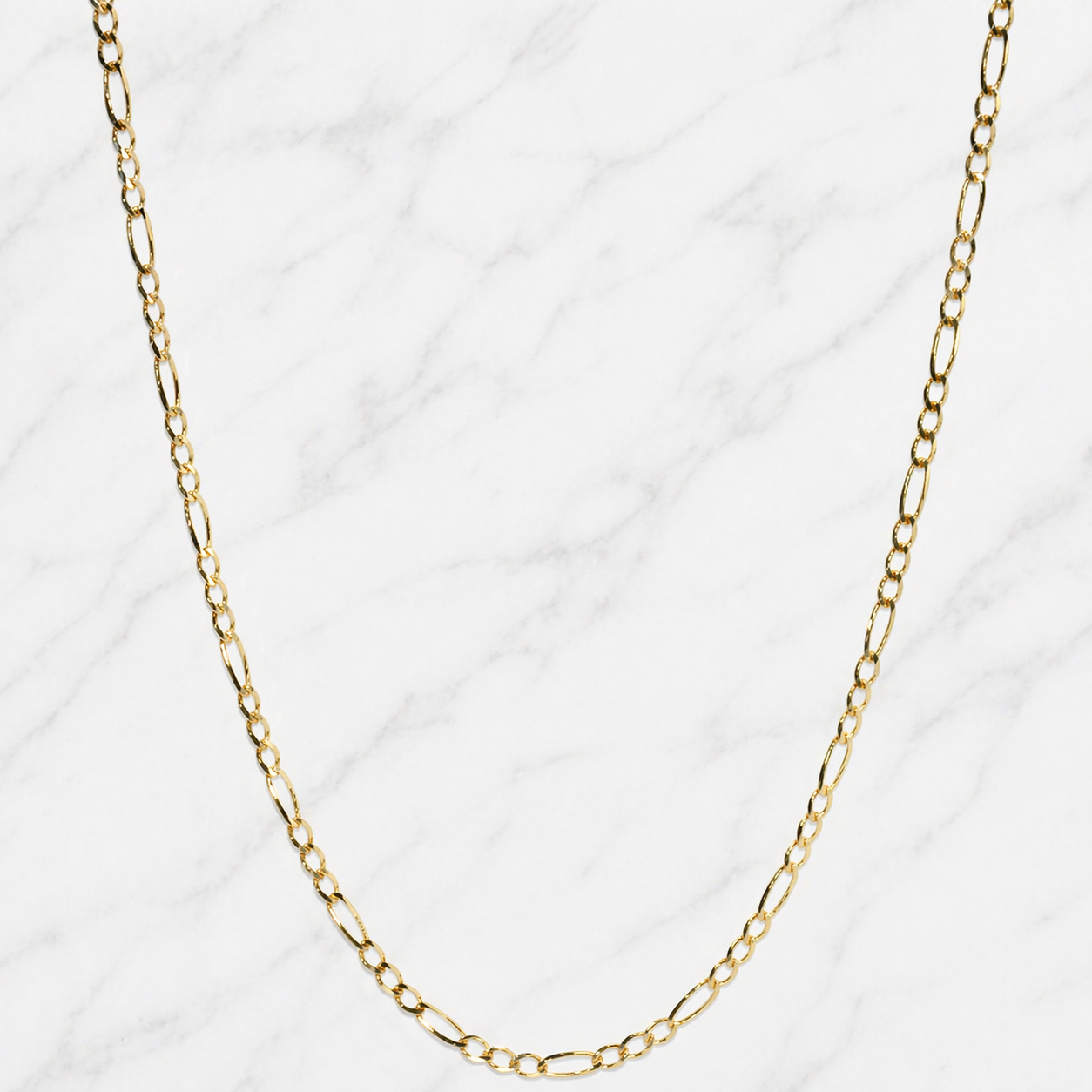 19.2K Portuguese Gold 18" 1.65mm Solid Figaro chain necklace on a white background