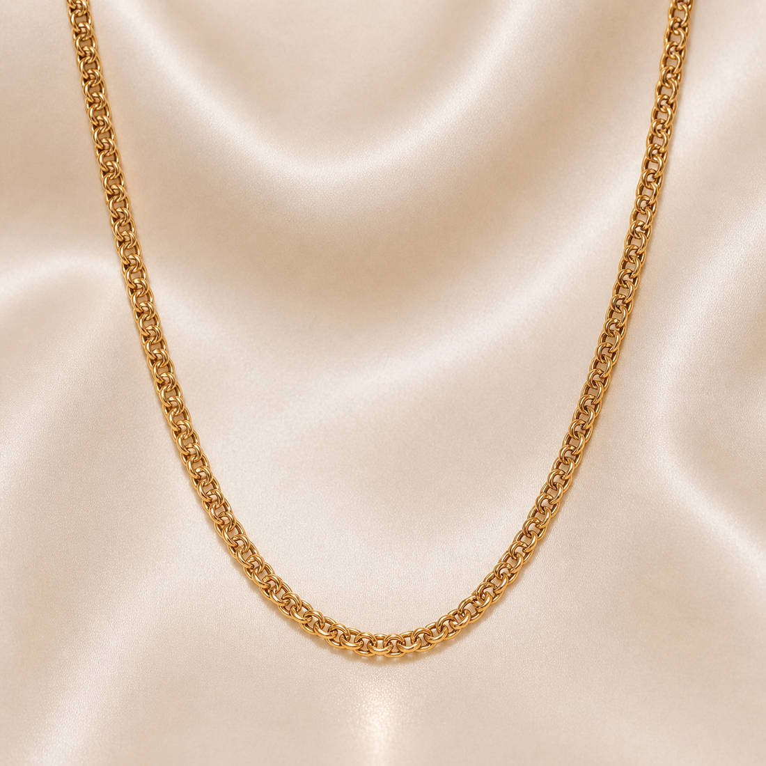 Gold chain necklace on a beige fabric background 19.2K Portuguese Gold | 24" 3mm Hollow Freeze Chain