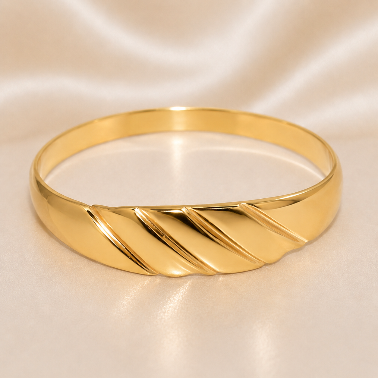 Gold bracelet on a satin surface 19.2K Portuguese Gold | Thin Shrimp Style Ring