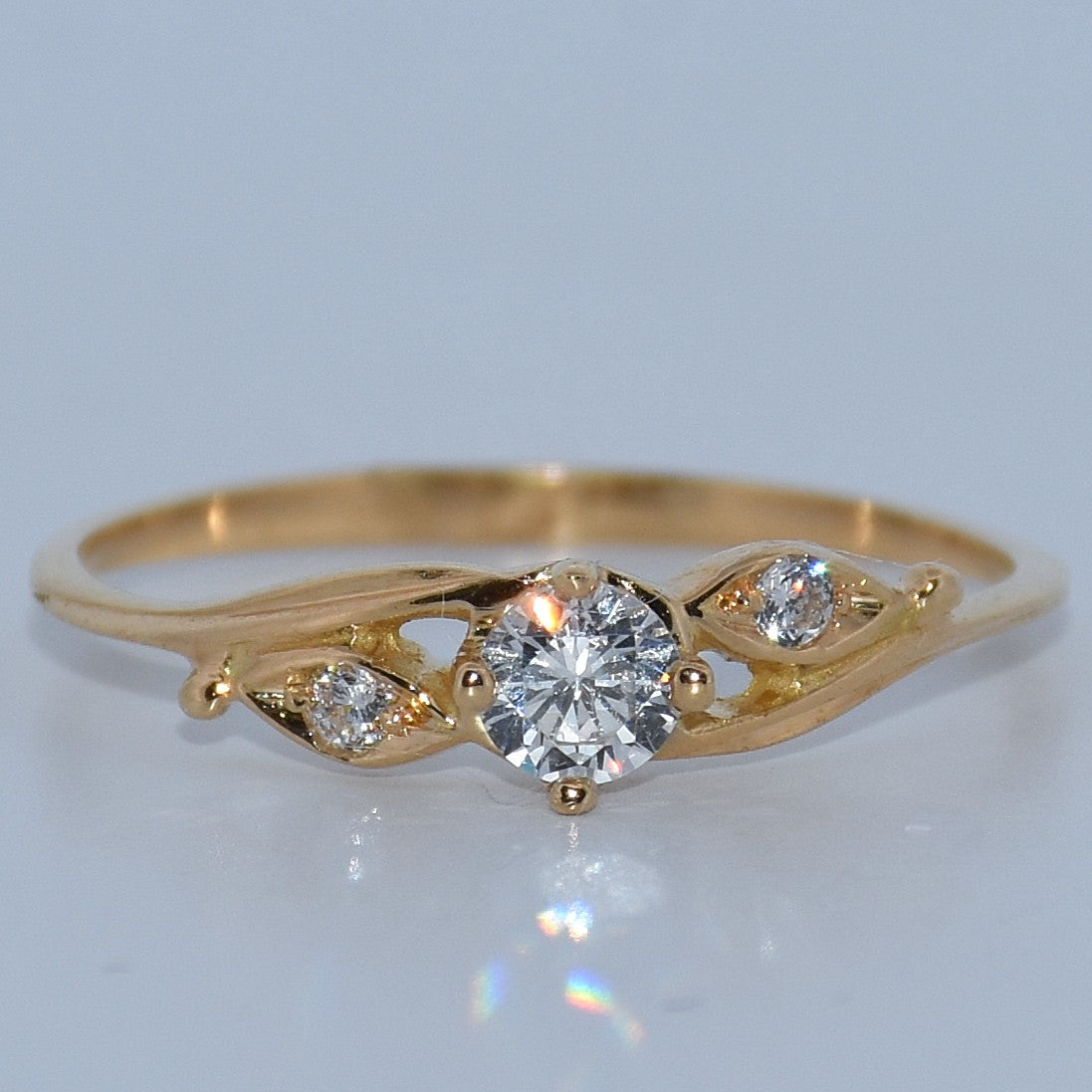 19.2K Portuguese Gold ring with three Round & Marquise CZ 