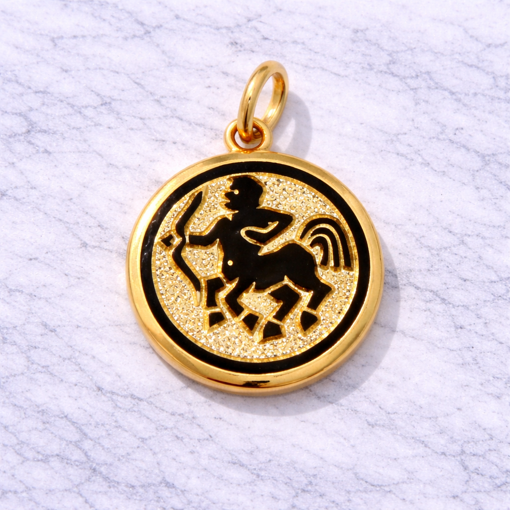 19.2K Portuguese Gold and black zodiac  Sagittarius pendant on a textured white background