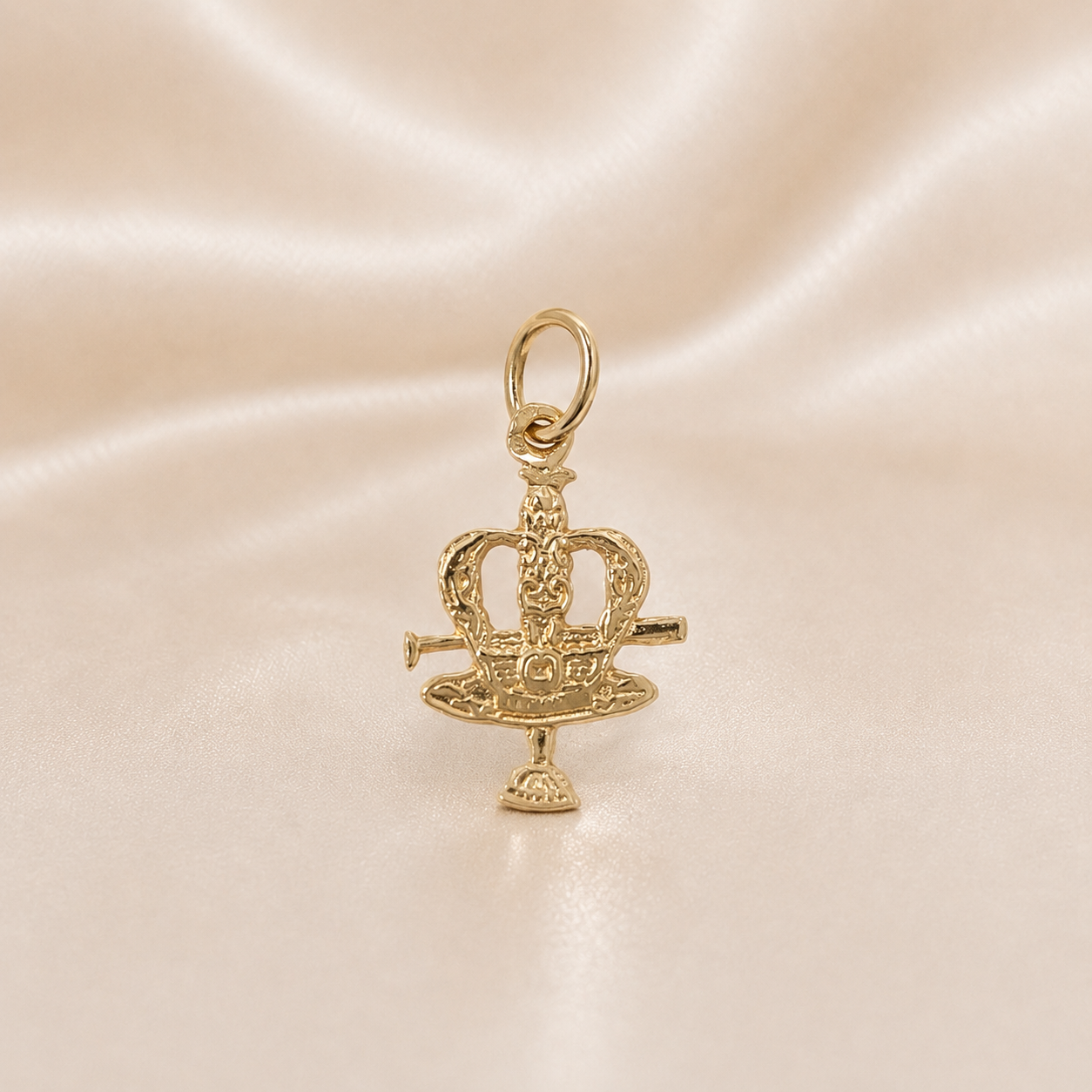 Gold crown pendant on a satin background 19.2K Portuguese Gold | Holy Ghost Crown (Coroa do Espírito Santo) Cutout Charm