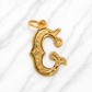 Gold letter 'C' pendant on a white background 19.2K Portuguese Gold | Large Initial Charm Letter Pendants Initial Letter C 